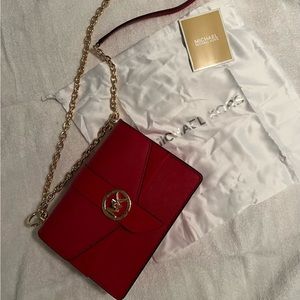Michael Kors red purse.  Brand new, never used.